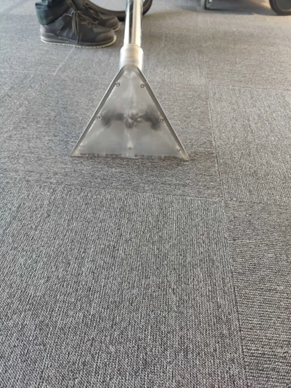 Carpet washing on office carpet tiles